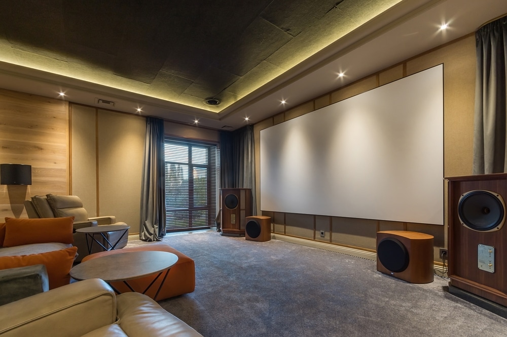 A view of a home theatre with speakers