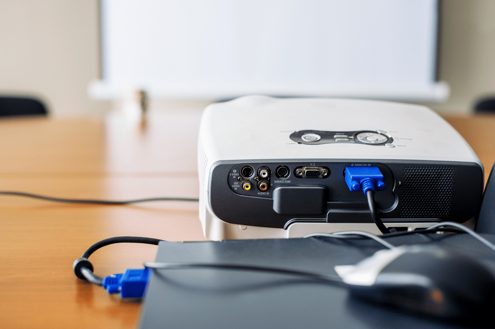 A view of a projector connected to a laptop