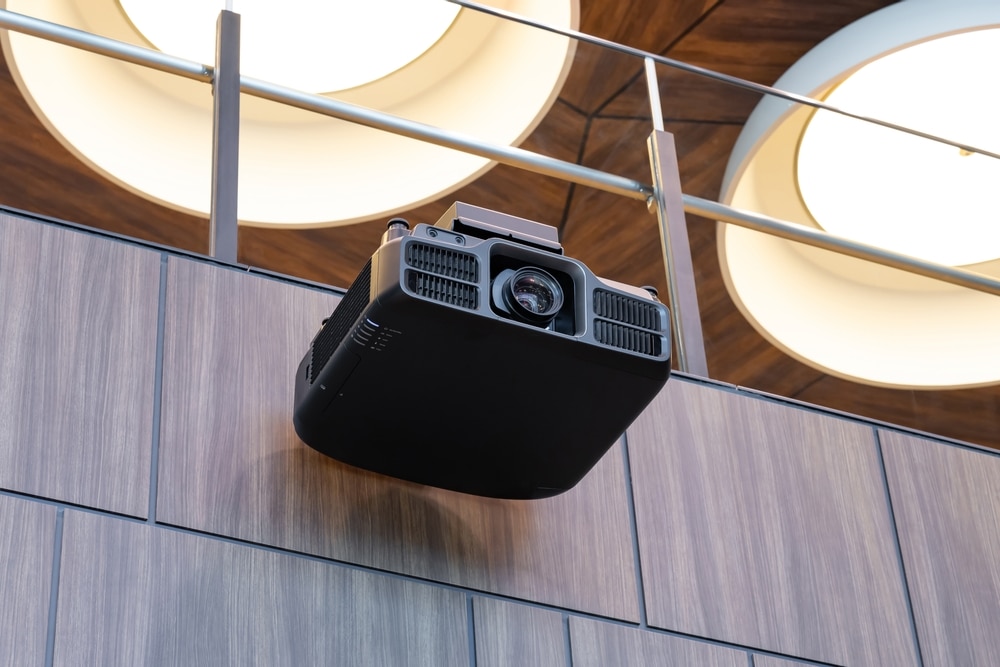 A view of a projector on a ceiling