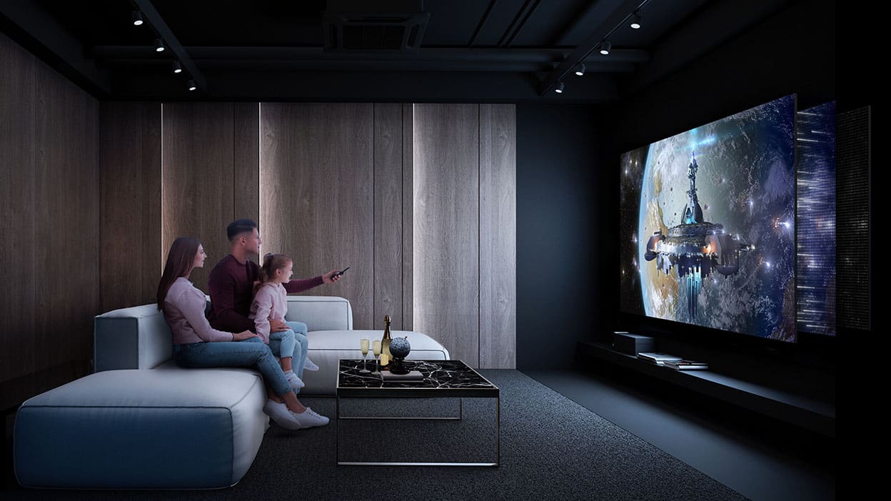 A view of a family watching television in the lounge