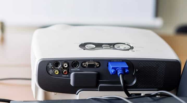 A view of projector backside connected to a wire